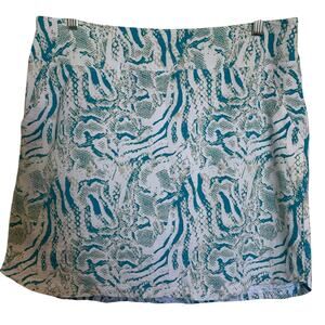 Nivo Sport skort blue size medium women's Round hem